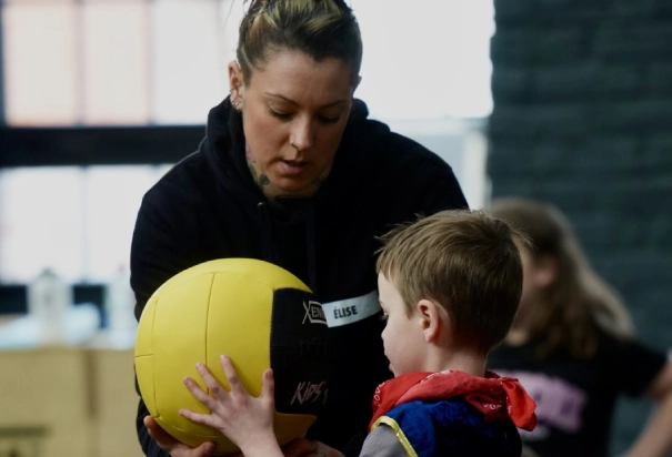 kid hold the ball